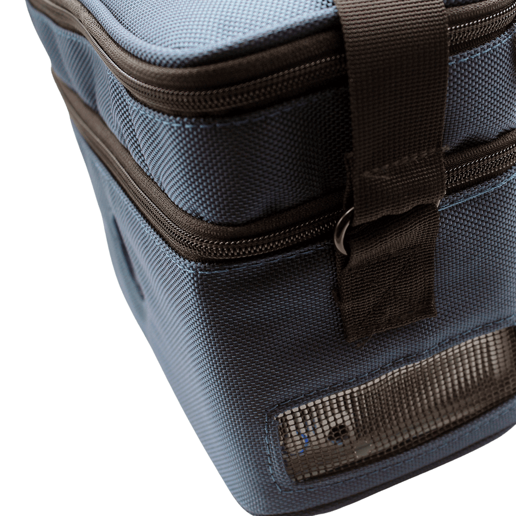 photo of the side of the lifeinatravel, focusing on the ventilation holes in the shoulder bag